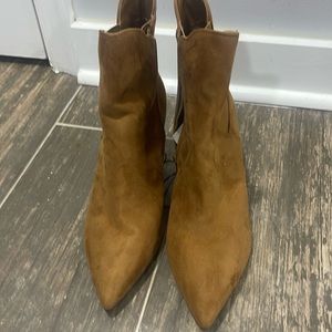 Brand new heeled boots.